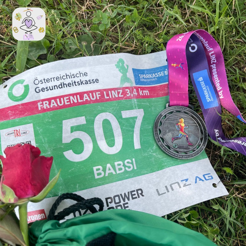 Startnummer mit Rose und Medaille